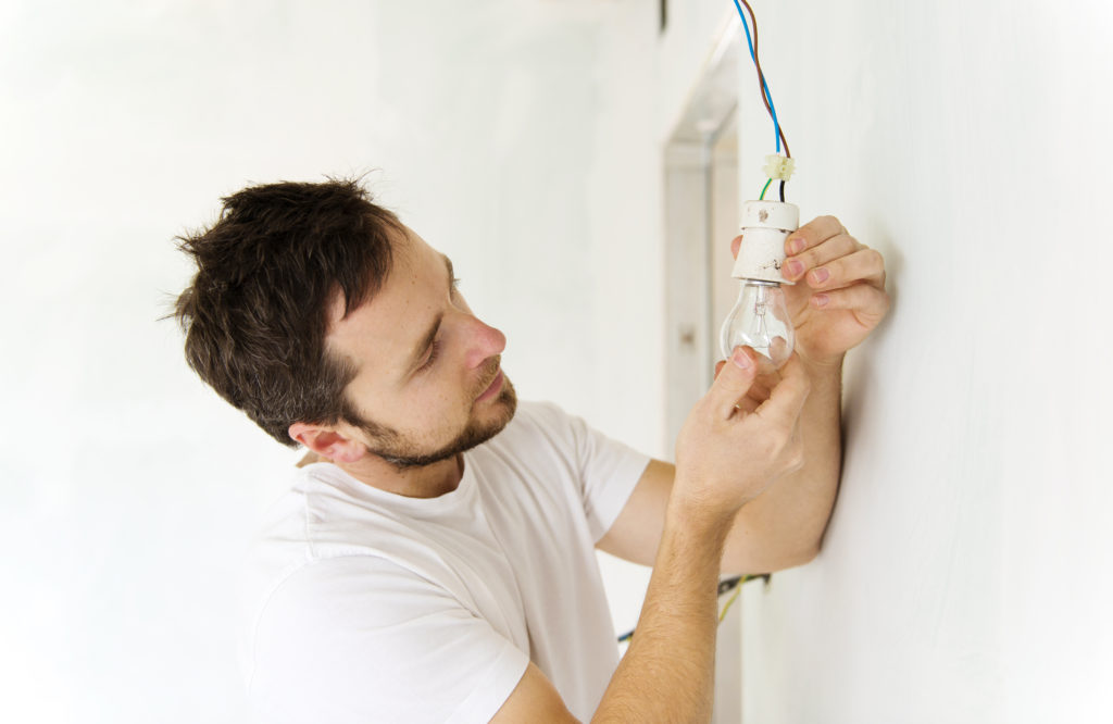 electric contractor performing electrical repairs